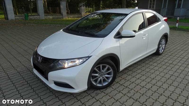 Honda Civic 1.4 Comfort - 1