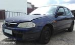 Mazda 323 gasolina de 2000 para peças - 1