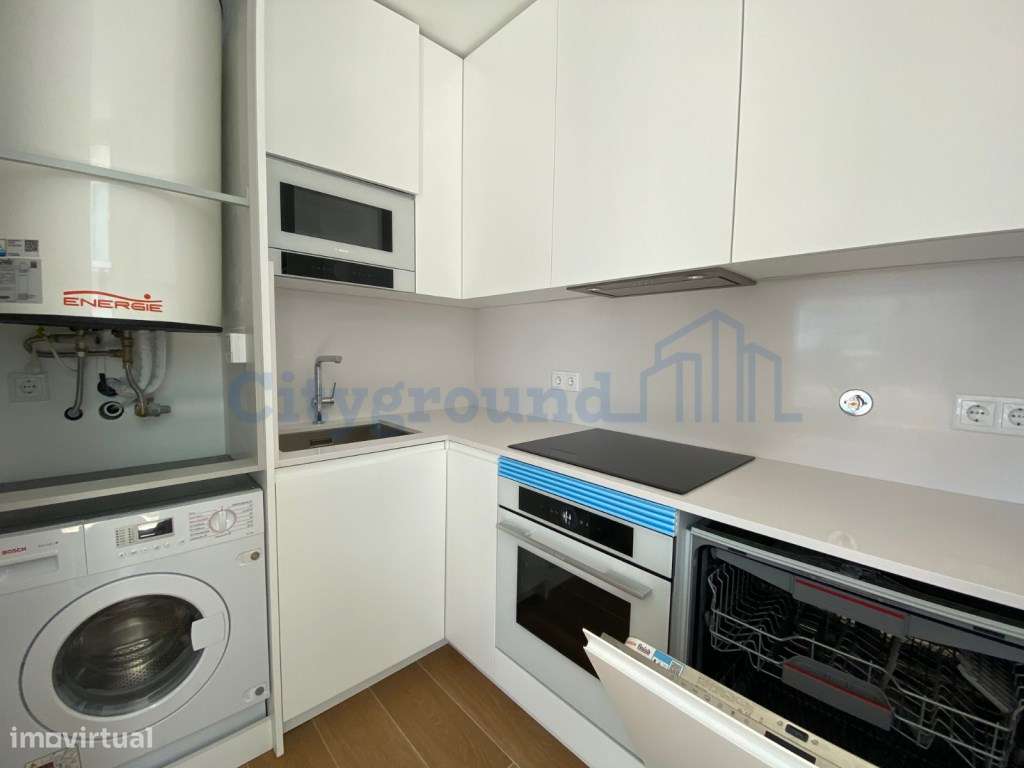 Apartamento T1 com terraço, em condomínio de luxo em frente à praia - Grande imagem: 4/24