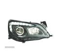 FARÓIS FRONTAIS PARA OPEL ASTRA J 09-15 FUNDO PRETO - 1