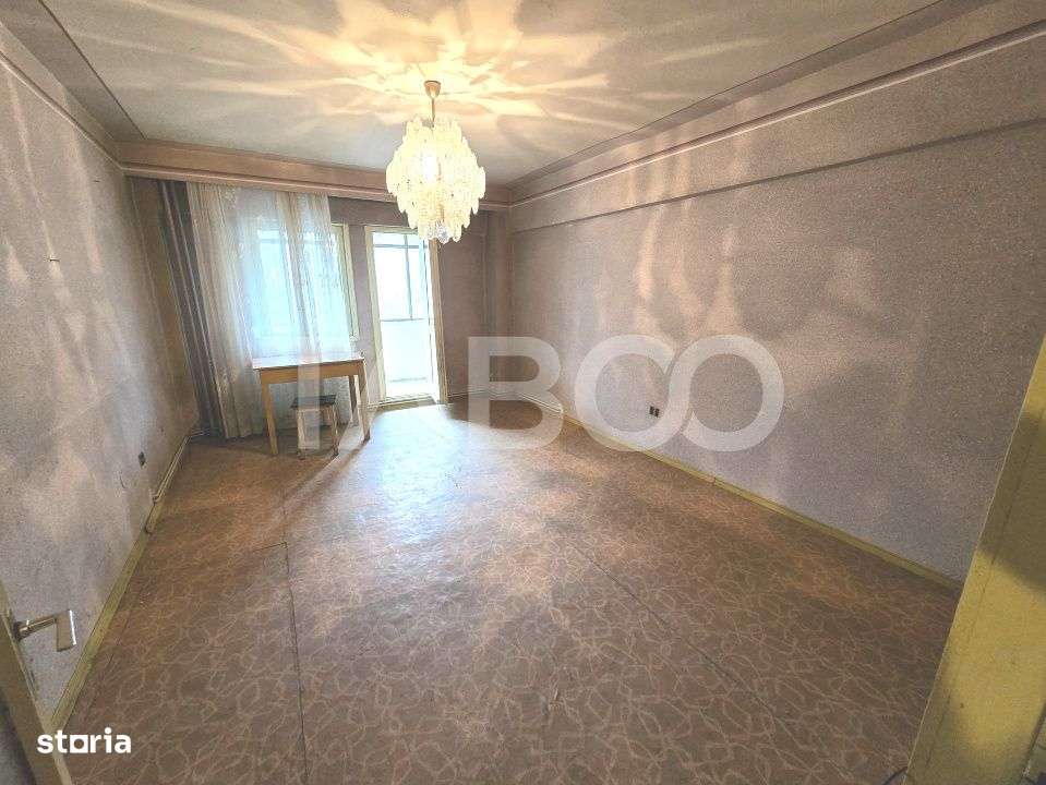 Apartament decomandat 4 camere 4 balcoane 2 bai etaj 1 Central Sibiu - Imagine principală: 2/19