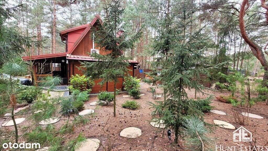 Działka w otoczeniu lasu z domem mieszkalnym i SPA-7