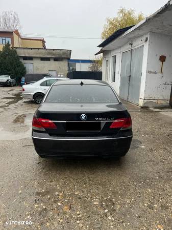 Dezmembrez BMW seria 7 E66 730Ld M57 231cp cutie calculator usa aripa capota portbagaj trager bara faruri xenon stop interior jante navigatie oglinzi plafon praguri volan etc - 7