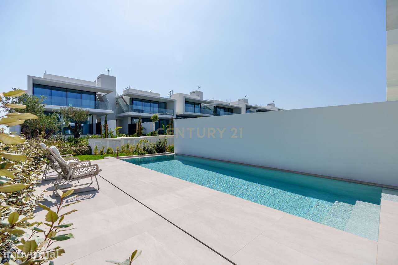 Moradias novas com piscina privativa, rooftop e garagem | Quinta Doura - Grande imagem: 4/38