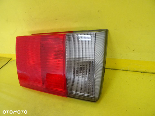 LAMPA LEWY TYŁ W KLAPE HELLA AUDI 100 C4 SEDAN 4A0945093 NR447 - 4