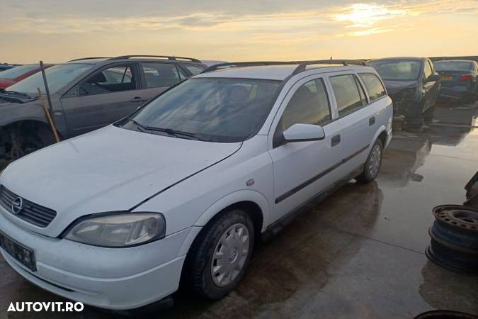 Alternator 1.7 DTI Opel Astra G  [din 1998 pana  2009] wagon 5-usi 1.7 DTi AT (75 hp) - 7
