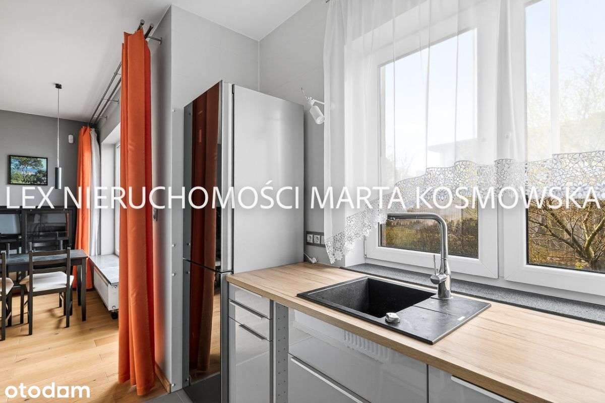 Elegancki, z ogródkiem i garażem – další