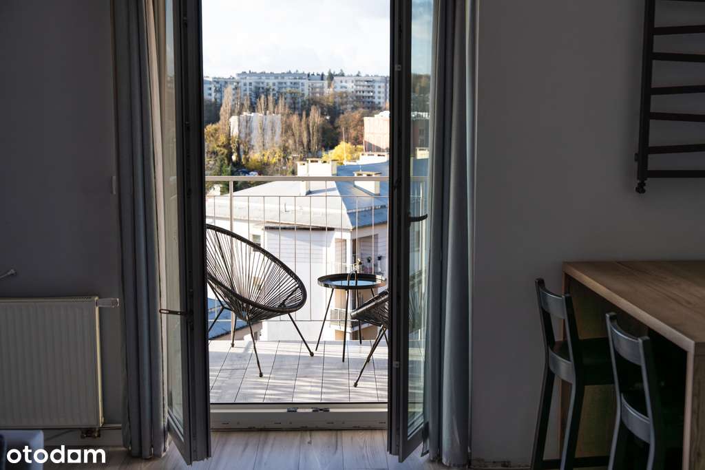 Nowoczesna kawalerka z widokowym balkonem-17