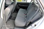 Kia Carens 2.0 CVVT LX - 29