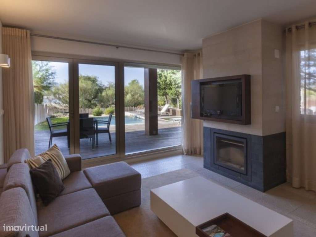 T2 com piscina e jardim privados, à frente da praia de Tróia - Grande imagem: 4/24