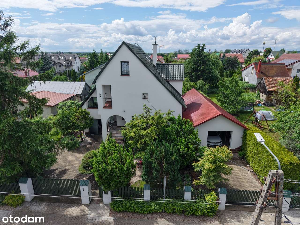 Zadbany dom z ogrodem, warsztatem i garażem