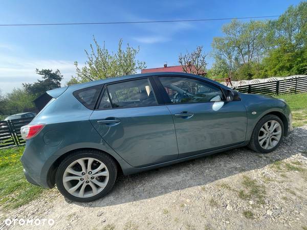 Mazda 3 2.0 Exclusive + - 15