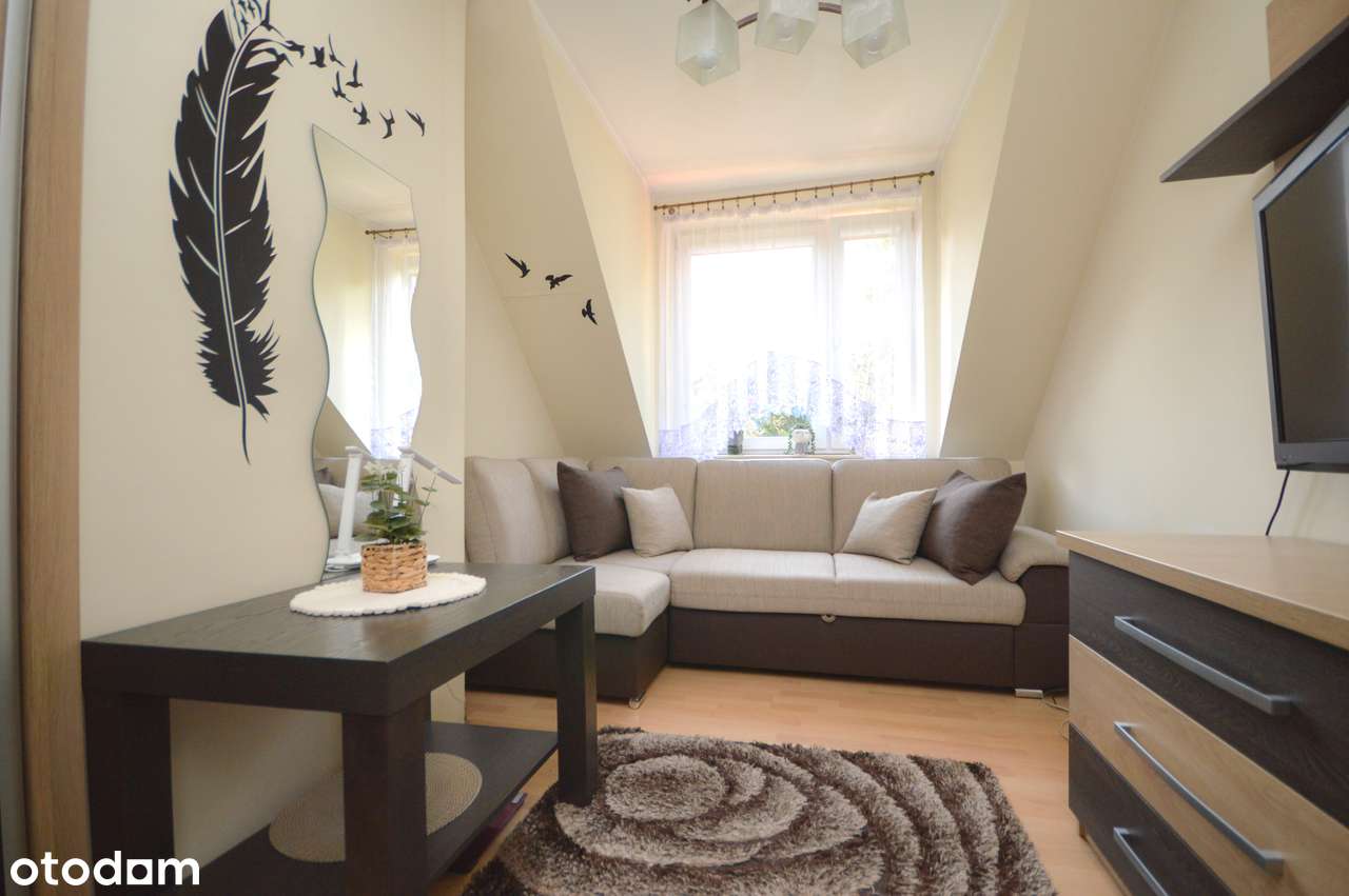 Budynek usługowo-mieszkalny przy głównej drodze krajowej nr 44-8