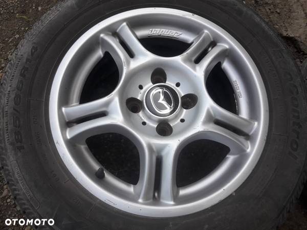 Toyota Yaris Aygo Corolla Mazda 323f Alufelgi z oponami 14c 5x114,3 - 3