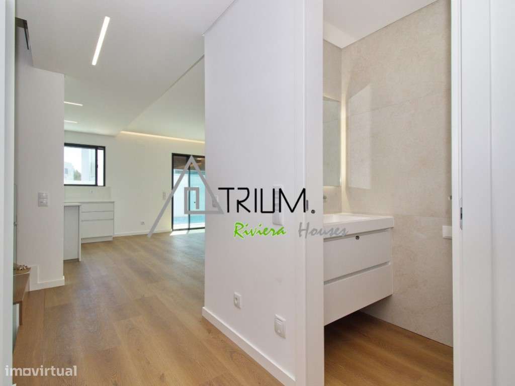 Moradia T4+1 Isolada com piscina e jardim nova-12