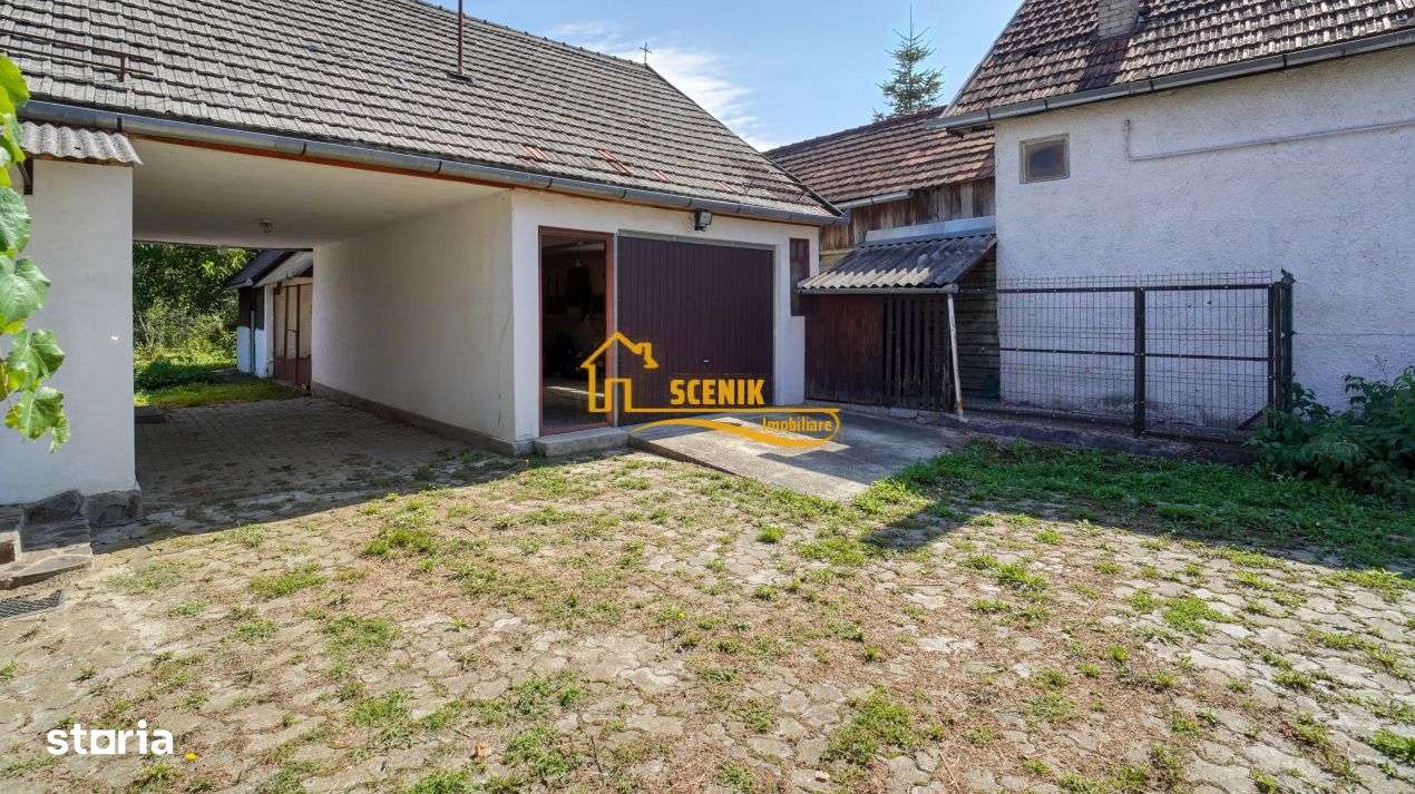 Covasna, casa cu structura deosebita, curte generoasa, dependinte foar-14