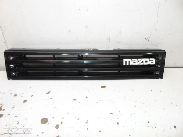Mazda 323 grelha - 1