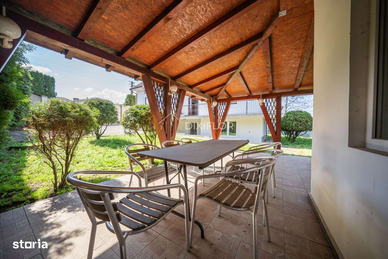 Casa într-o zonă liniștită la 7 minute de oraș - Imagine principală: 3/13