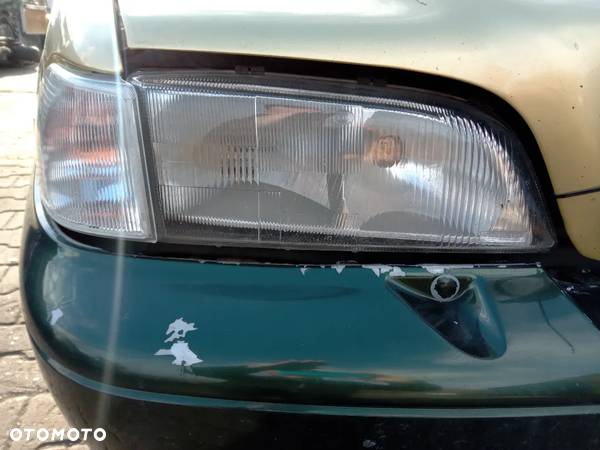 Lampa przednia prawa VOLVO V70 I EU - 1