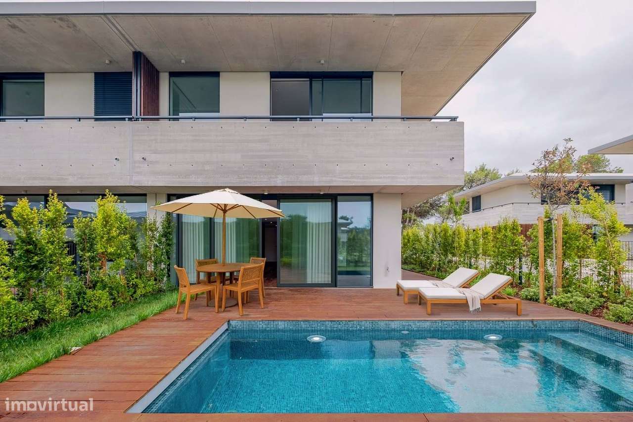 T3 - Belissima Moradia com piscina privativa em condomínio sustentável - Grande imagem: 1/35