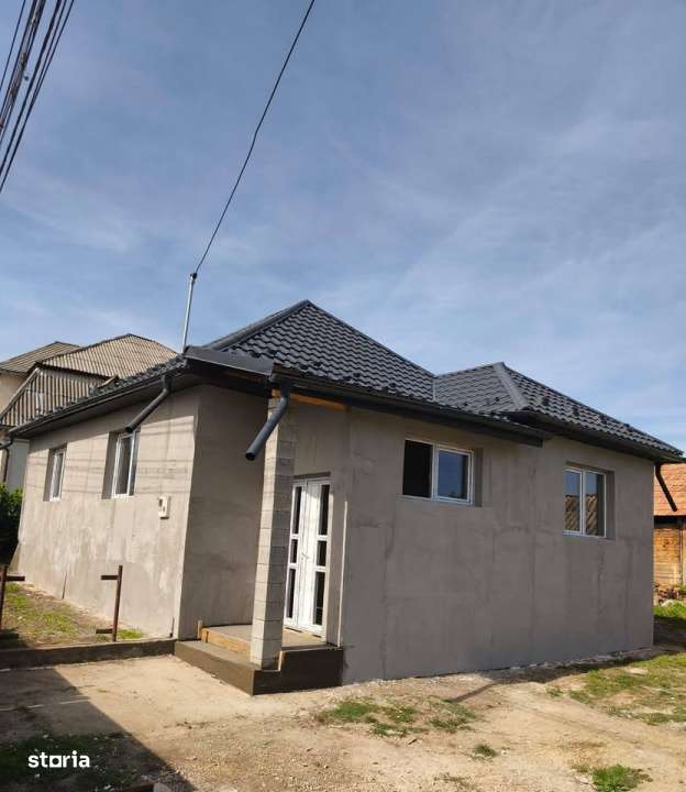Casa de vanzare 80 mp - 4 camere- teren 400mp -105 000 euro.-0