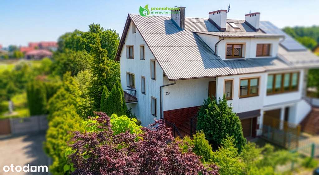 Przestronny dom j z dużym ogrodem i garażem