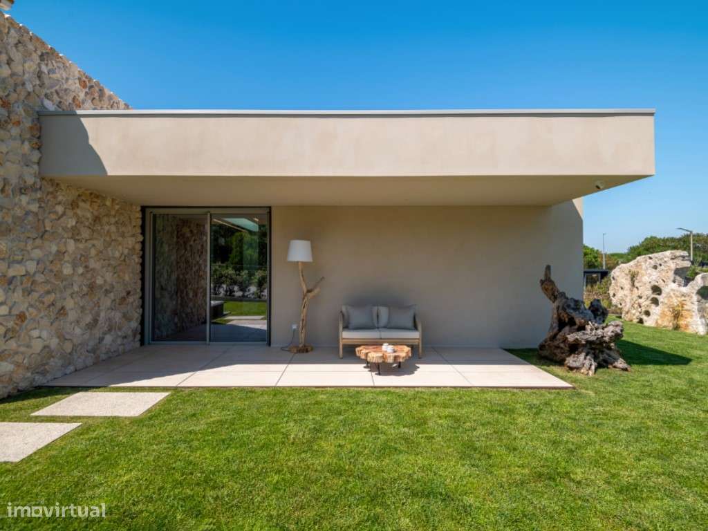 Moradia de extraordinária qualidade junto à lagoa, golfe e praia-25