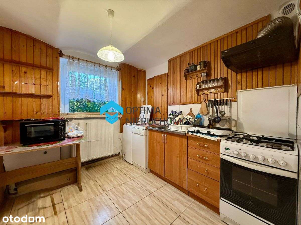 Dom z potencjałem w spokojnej dzielnicy-5