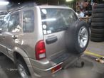 Carro MOT: RHZ   DW10ATED SUZUKI GRAND VITARA 2002 2.0TDI 4X4 110CV 5P DOURADO DIESEL - 1