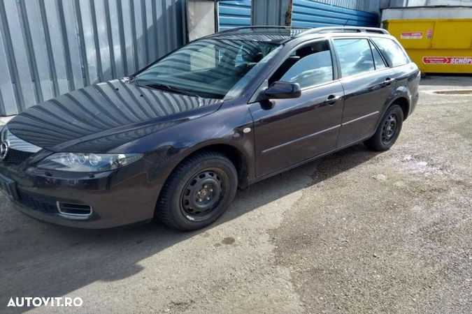 Radiocasetofon Mazda 6 GG (facelift)  [din 2005 pana  2007] seria wagon 2.0 MZR-CD MT (143 hp) - 2