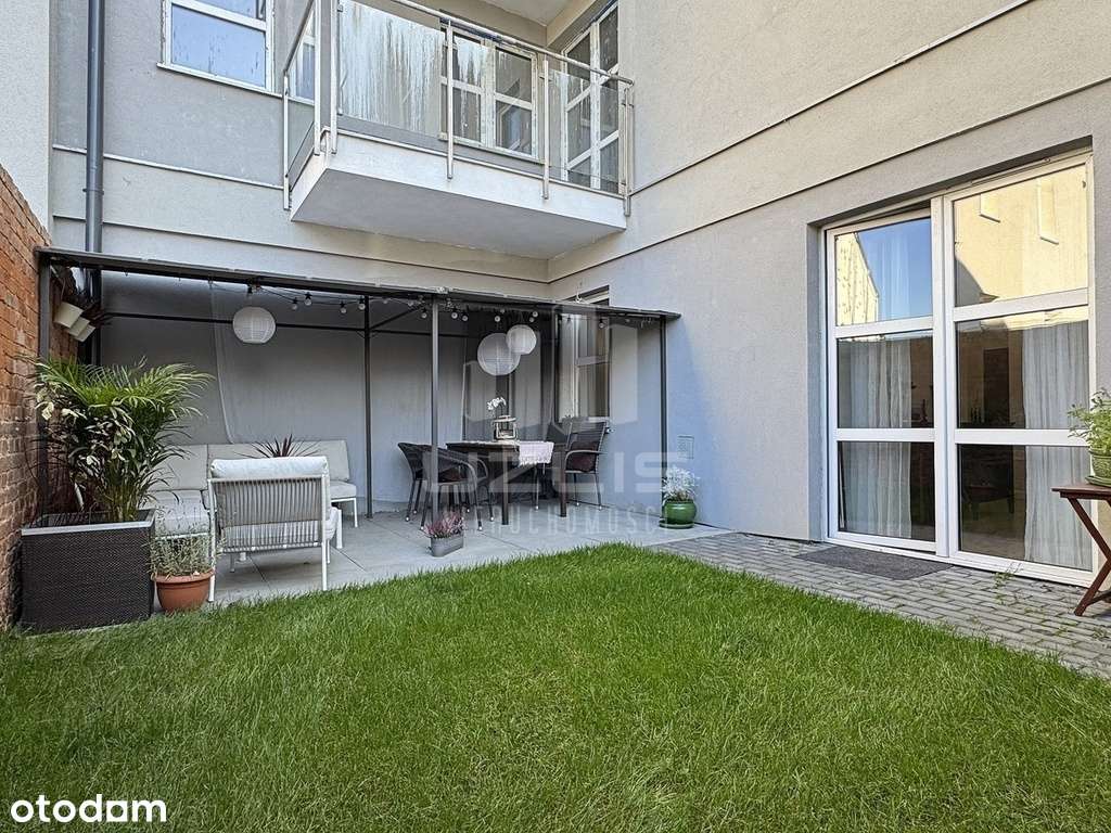 Okazałe mieszkanie w centrum z prywatnym ogrodem-16