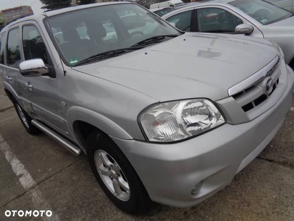 MAZDA TRIBUTE BLOTNIK LEWY PRAWY SREBNY LIFT ORYGIN CZESCI ROZNE - 2