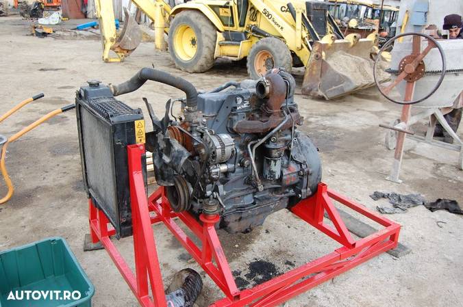 Motor buldoexcavator NEW HOLLAND - FIAT HITACHI - 5