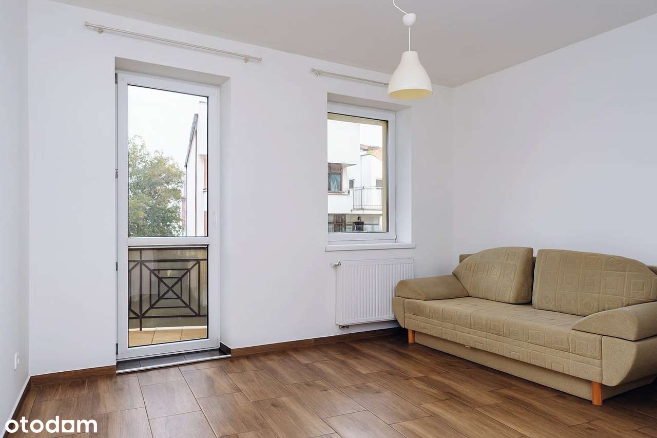 Komfortowe 33 m² z balkonem i garażem | Osiedle Bukowy Dworek-1