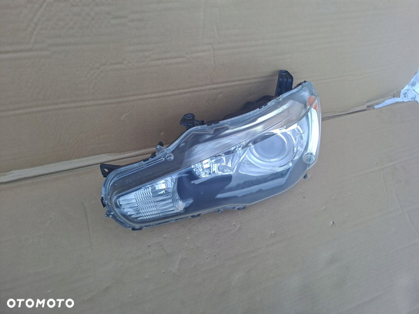 MITSUBISHI OUTLANDER LIFT 10-12 LEWA LAMPA XENON UŻYWANA - 4