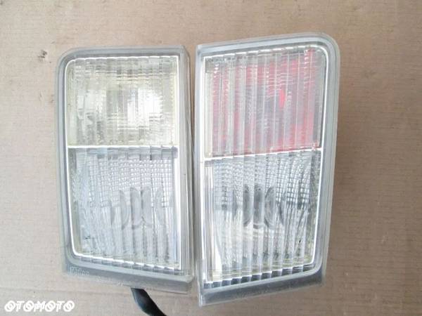 LAMPA COFANIA Cadillac bls 06- - 1