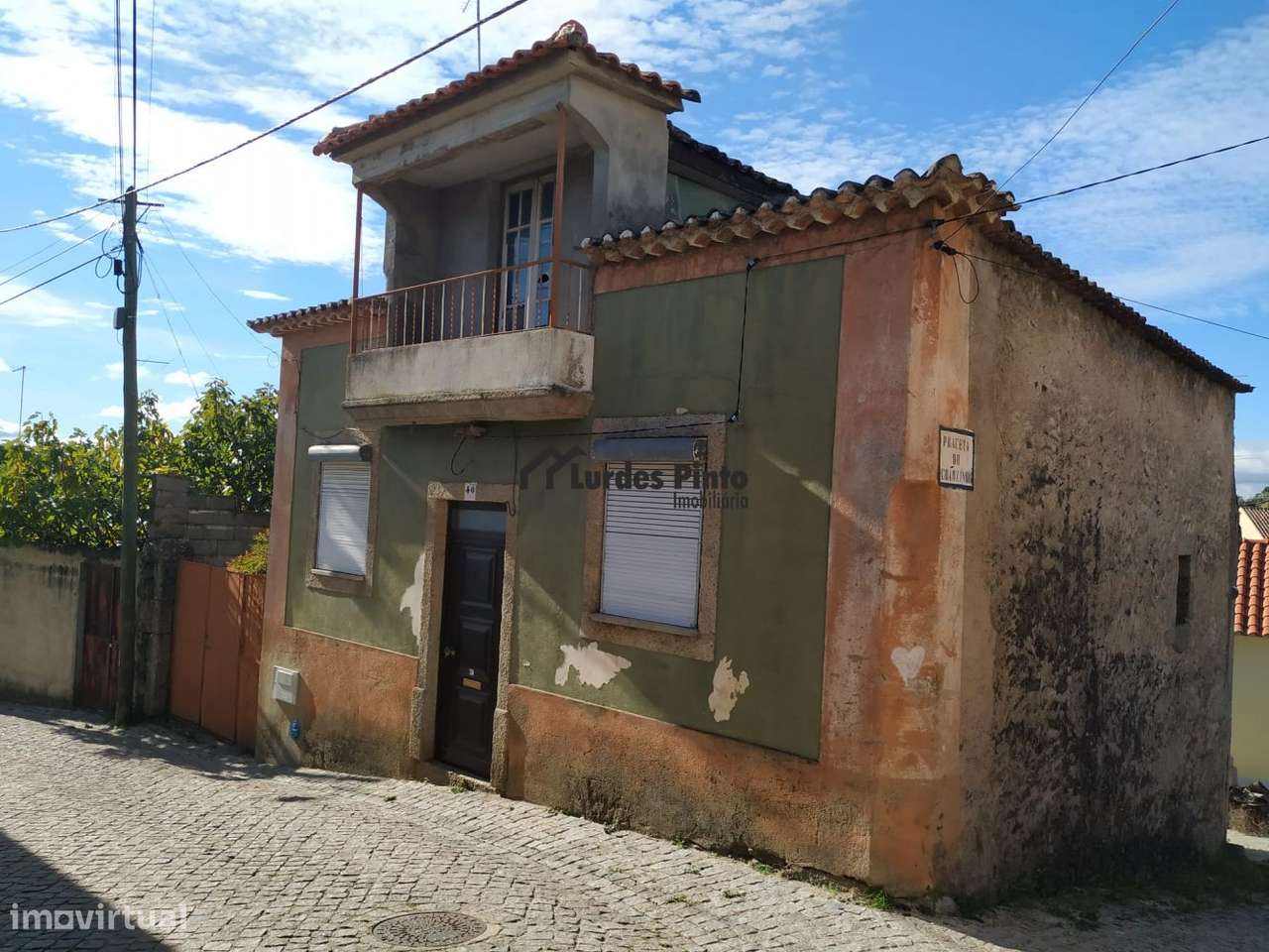 Moradia com terreno - Grande imagem: 1/17