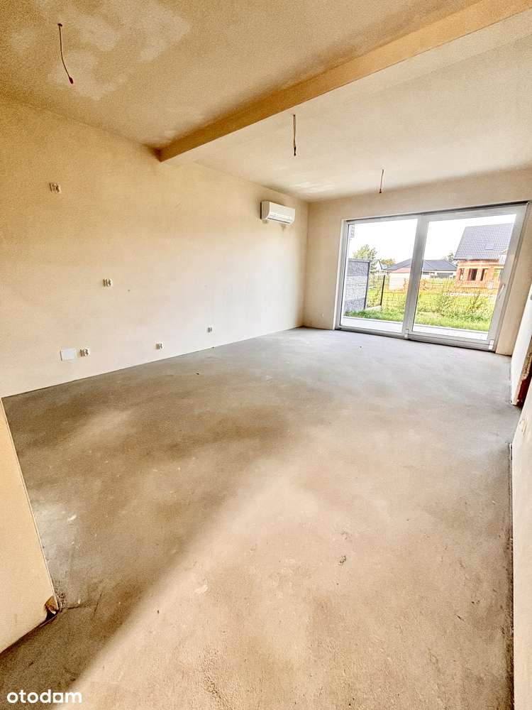 Nowe mieszkanie z ogrodem i parkingiem w spokojnej dzielnicy-9