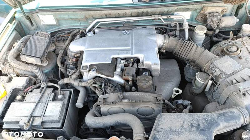 30474 MITSUBISHI PAJERO 1.8 16V NA CZĘŚCI KOD LAKIERU F99H00 - 8