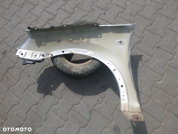 BŁOTNIK PRAWY PRZÓD PRAWY PRZEDNI OPEL CORSA C - 10