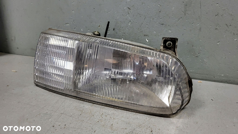 Lampa Prawy Przód Ford Windstar I F58B-13N086-B - 2