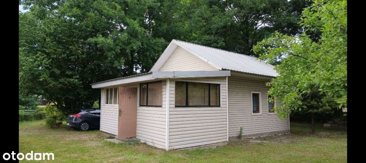 Działka siedliskowo leśna z domkiem-0