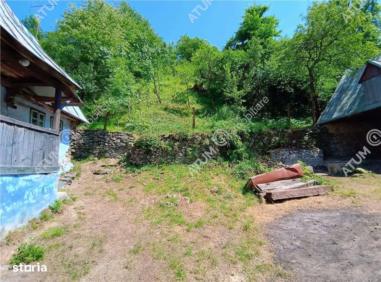 Casa traditionala din lemn cu 930 mp teren langa Sibiu - Imagine principală: 5/20