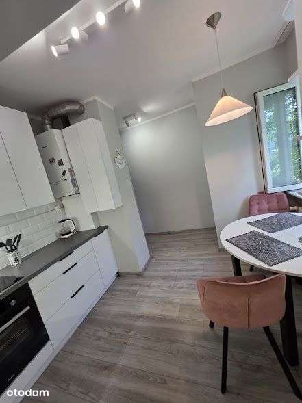 Piękne mieszkanie w willi plus ogród plus garaż.-1