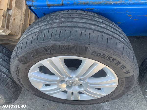 Set de jante cu cauciuc pentru Opel Astra H/Zafira B, 205/55R 16H, cod 0P026K7 - 4