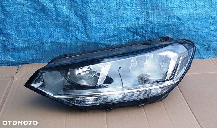 VW TOURAN 5TB LAMPA LEWA - 1