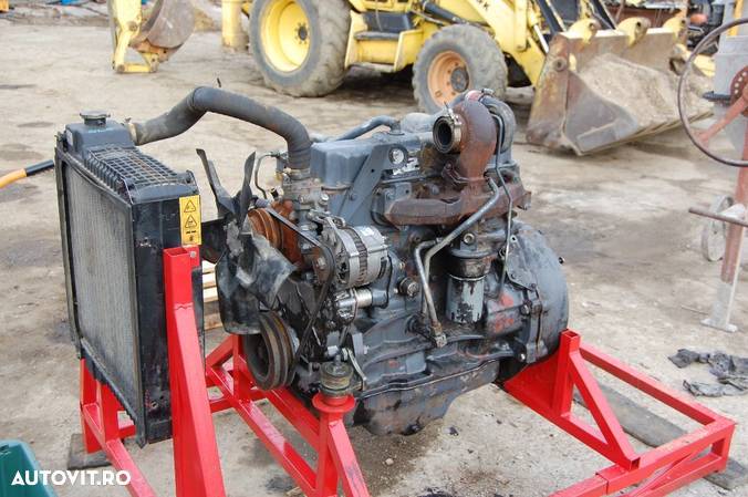 Motor buldoexcavator NEW HOLLAND - FIAT HITACHI - 6