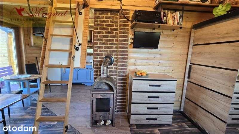 Atrakcyjny dom drewniany całoroczny na dużej dział-12