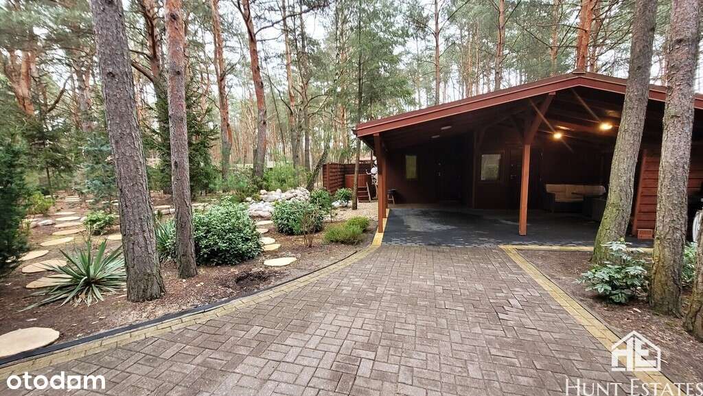Działka w otoczeniu lasu z domem mieszkalnym i SPA-12
