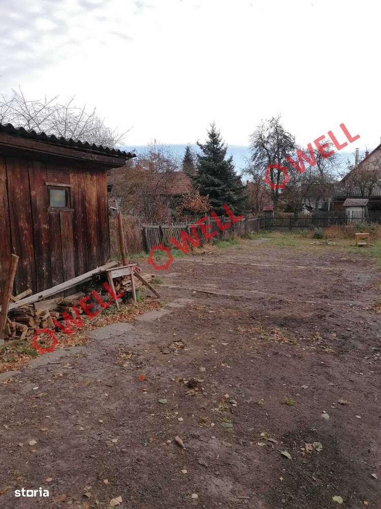 De vânzare o jumătate de casă familială în Târgu Secuiesc - Imagine principală: 4/9